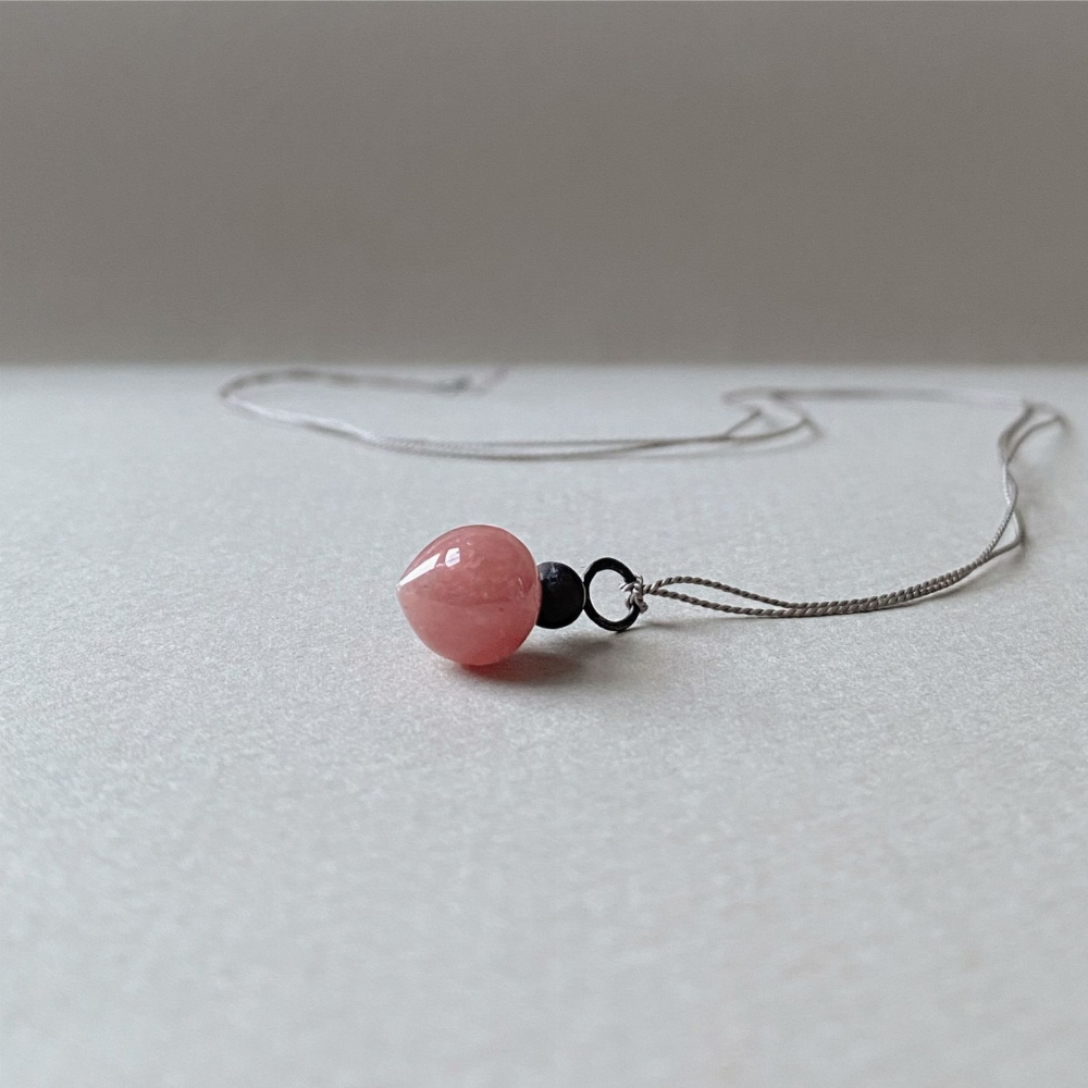 Jewel: silk, rhodochrosite, jaspis, oxidized silver